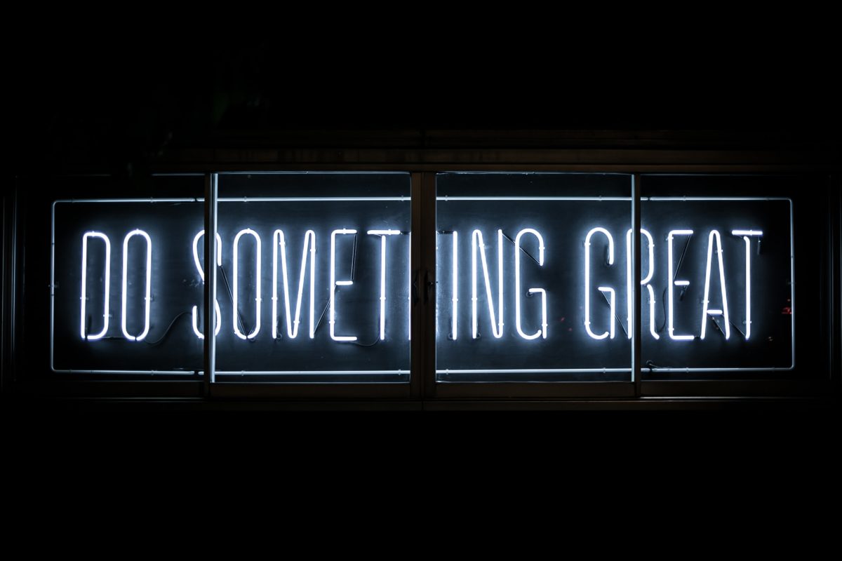 neon sign saying "Do Something Great"